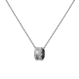 Silver necklace featuring a delicate chain and a round pendant set with sparkling crystals, showcasing a polished finish and minimalist design.