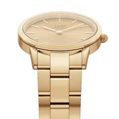 Daniel Wellington Iconic Link Unitone G gold watch featuring a tone-on-tone gold dial, slim gold markers, and a polished gold stainless steel link bracelet, shown from a front angle.