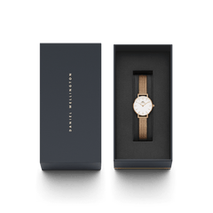 Petite Pressed Melrose Rose Gold ladies watch with a rose gold mesh strap and minimalist white dial, elegantly presented in a branded gift box, ideal for gifting or adding to a personal collection.
