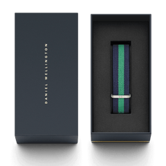 Warwick Strap Silver 20mm NATO watch strap in navy and green stripes, presented in a sleek Daniel Wellington gift box with a secure foam insert.