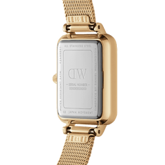 Back view of the Quadro Lumine Pressed Evergold gold watch showing its stainless steel case, engraved details, and adjustable gold mesh strap.