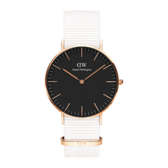 Classic Dover Black Rose Gold watch with a minimalist black dial, rose gold case, and crisp white NATO strap, showcasing a refined and versatile design suitable for both men and women.
