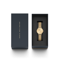 Petite Unitone Gold watch with a gold mesh strap and minimalist dial, presented in a sleek black Daniel Wellington gift box, ideal for gifting or adding to your collection.