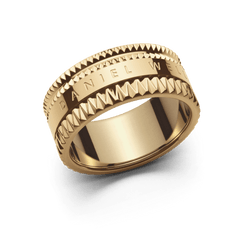 Chunky gold Elevation Ring Gold with geometric textured detailing and engraved branding, crafted from stainless steel with PVD gold plating, shown against a plain background.