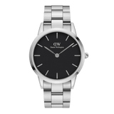 Classic Daniel Wellington Iconic Link watch with a polished stainless steel bracelet and minimalist black dial, featuring a sleek round face and silver hour markers.