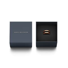 Elan Dual Ring Rose Gold presented in a navy Daniel Wellington gift box, highlighting its double-band design and elegant rose gold finish, ideal for gifting or adding to your jewellery collection.