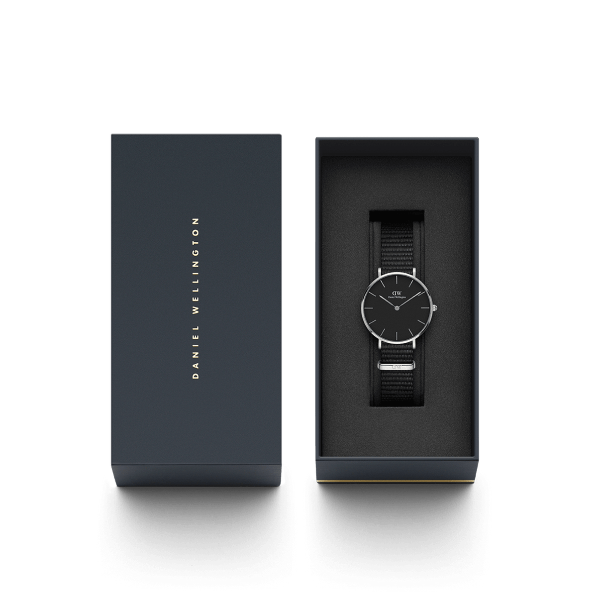 Petite Cornwall Black Silver watch with a black dial and silver case, presented in a dark Daniel Wellington gift box with foam padding for protection.