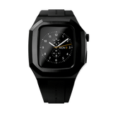 Switch Black Black Apple Watch case in brushed stainless steel with a matte black finish, featuring geometric contours, an integrated FKM rubber strap, and a secure deployment clasp for Series 6, 5, 4, and SE models.