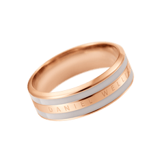 Rose gold ring with a minimalist band design, featuring a soft desert sand enamel inlay and the Daniel Wellington logo engraved along the side.