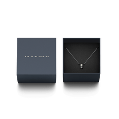 Emalie Necklace Silver Black presented in a sleek Daniel Wellington gift box, highlighting its minimalist silver chain and bold black enamel pendant, ideal for gifting or adding a refined touch to any jewellery collection.