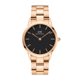 Rose gold Daniel Wellington Iconic Link Black watch featuring a minimalist black dial, slim rose gold hour markers, and a polished stainless steel bracelet strap.