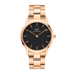 Rose gold Daniel Wellington Iconic Link Black watch featuring a minimalist black dial, slim rose gold hour markers, and a polished stainless steel bracelet strap.