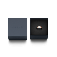 Daniel Wellington Emalie Ring Satin White Rose Gold presented in a sleek navy gift box, highlighting the rose gold band with satin white enamel detailing as a stylish and thoughtful jewellery gift.