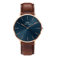 Classic St Mawes Arctic Rose Gold watch featuring a deep blue minimalist dial, rose gold round case, slim line markers, and a brown Italian Nappa leather strap with a polished rose gold buckle.
