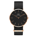 Classic Cornwall Black Rose Gold watch featuring a minimalist black dial, slim rose gold stainless steel case, and an adjustable black NATO style polyester strap.