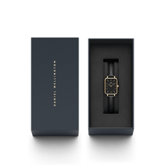 Quadro Pressed Sheffield Black Gold ladies watch with a rectangular gold case and black leather strap, elegantly presented in a branded gift box.