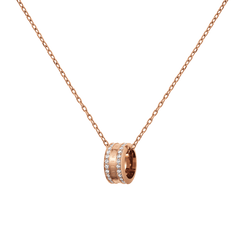 Rose gold necklace featuring a round pendant with crystal accents and engraved detailing, suspended from a delicate adjustable chain.
