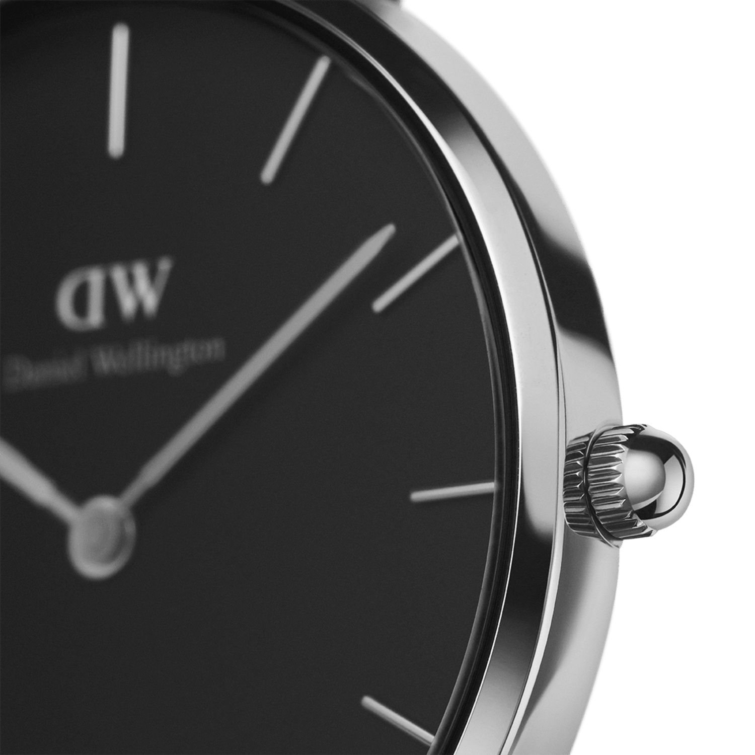 Detail view of the Petite York Black Silver watch, highlighting the polished silver stainless steel case, minimalist black dial, and precise crown design.