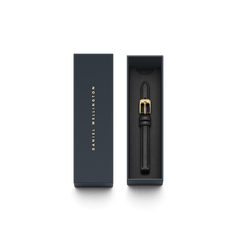 Pressed Sheffield Strap Gold in a Daniel Wellington presentation box, featuring a slim black leather strap with a gold buckle, ideal for adding a refined touch to smaller watch faces.