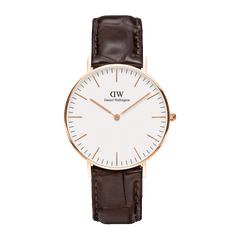 Classic York Rose Gold watch with a slim rose gold case, minimalist white dial, and dark brown croc-embossed genuine leather strap, featuring simple hour markers and a refined, timeless design.