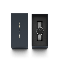 Petite Sterling Black Silver watch presented in a sleek Daniel Wellington gift box, featuring a minimalist black dial and silver mesh strap, ideal for gifting or special occasions.