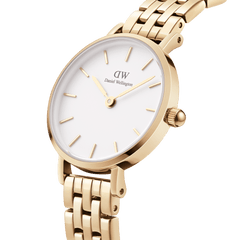 Close-up of the Petite 5-Link Evergold ladies watch showing its gold PVD-plated stainless steel case, minimalist white dial, and elegant 5-link bracelet, highlighting the refined finish and modern design.