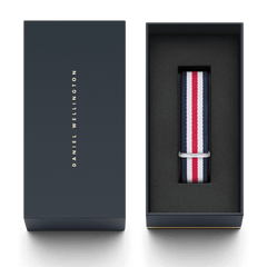 Canterbury Strap Silver presented in a premium Daniel Wellington gift box, featuring navy, white, and red stripes with a polished silver buckle, ideal as a stylish and versatile NATO watch strap.