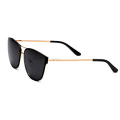 Ambler Steel Rose Gold sunglasses with a rose gold plated stainless steel frame, dark rounded nylon lenses, and black cellulose acetate temple tips, showcasing a sleek side profile and modern classic styling.