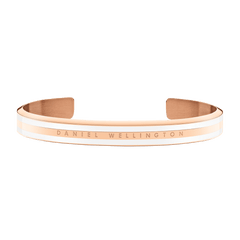 Slim rose gold bracelet with satin white enamel detailing, featuring the engraved Daniel Wellington logo and a minimalist open cuff design suitable for everyday wear.