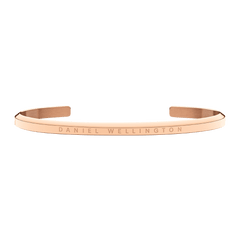 Classic Bracelet Rose Gold by Daniel Wellington featuring a slim, open cuff design in stainless steel with a PVD plated rose gold finish and subtle engraved branding.