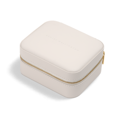 Travel Jewellery Box White featuring a sleek white exterior, gold zip closure, and compact design, ideal for keeping jewellery organised and protected during travel or daily use.