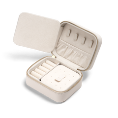 Travel Jewellery Box White with a soft white finish, gold zip, and plush interior, featuring ring rolls, earring holders, and a pouch pocket for organised jewellery storage during travel or at home.