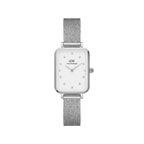 Quadro Lumine Pressed Sterling features a petite rectangular silver case, eggshell white dial with crystal indexes, and a slim silver mesh bracelet, offering a refined and comfortable fit for small wrists.