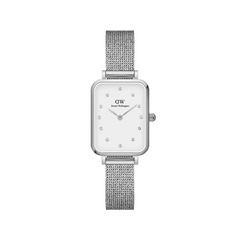 Quadro Lumine Pressed Sterling features a petite rectangular silver case, eggshell white dial with crystal indexes, and a slim silver mesh bracelet, offering a refined and comfortable fit for small wrists.