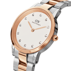 Close-up of the Iconic Link Lumine Rose Gold ladies watch, showcasing its polished rose gold and silver stainless steel bracelet, eggshell white dial, and crystal hour markers for a refined and elegant look.