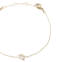 Gold chain bracelet with an adjustable clasp, featuring a Virgo zodiac charm set with sparkling crystals and a minimalist, elegant design.