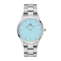 Silver stainless steel bracelet watch with a pastel blue dial, minimalist hour markers, and a secure clasp, designed for women seeking a modern yet timeless accessory.