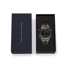 Daniel Wellington Retro Digital Dark Grey Dark Grey watch presented in its branded box, featuring a bold dark grey finish, digital display, and transparent bio-based plastic link strap.