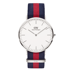 Classic Oxford Silver watch with a stainless steel case, minimalist white dial, and a blue and red striped NATO style polyester strap, designed for versatile everyday wear.