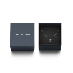 Elan Necklace Silver displayed in an elegant Daniel Wellington gift box, featuring a polished silver ring pendant on a fine chain, ideal for gifting or adding to a jewellery collection.
