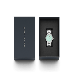 Iconic Link Mint Silver ladies watch with a mint green dial and stainless steel bracelet, elegantly presented in a Daniel Wellington gift box.