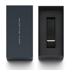 Cornwall Strap Rose Gold presented in a sleek Daniel Wellington gift box, featuring a black NATO-style polyester watch strap with a rose gold buckle for a refined and versatile upgrade.