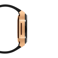 Side profile of the Switch Rose Gold Apple Watch case, highlighting the brushed rose gold stainless steel finish, bold geometric lines, and integrated black FKM rubber strap.
