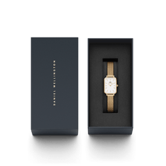 Quadro Pressed Evergold Gold watch presented in a sleek Daniel Wellington gift box, featuring a rectangular gold case and gold mesh bracelet, ideal for gifting or special occasions.