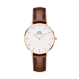 Petite St Mawes rose gold women’s watch with a minimalist white dial and a slim brown leather strap, featuring a refined design ideal for everyday wear and pairing easily with both casual and work outfits.