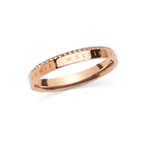 Slim rose gold ring with a polished finish, featuring an engraved detail and a single row of white crystals set along the chamfered edge for a subtle, sophisticated sparkle.