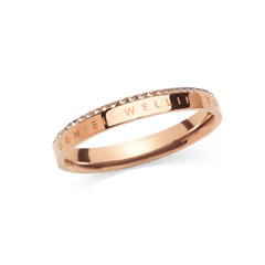 Slim rose gold ring with a polished finish, featuring an engraved detail and a single row of white crystals set along the chamfered edge for a subtle, sophisticated sparkle.