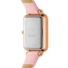Rear view of the Quadro Cherry Blossom watch showing the engraved stainless steel case back, rose gold frame, and pastel pink leather strap, highlighting water resistance and Japanese movement details.
