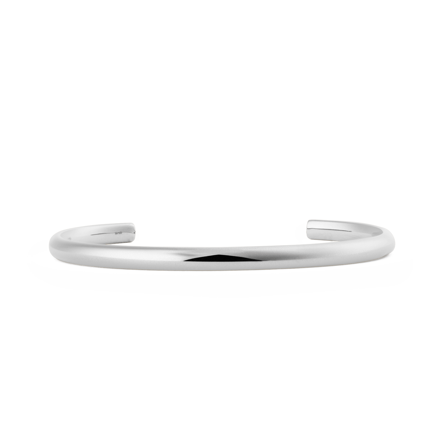 Polished silver Arch Cuff bracelet with a minimalist, open-ended design and smooth rounded edges, crafted from 316L stainless steel for a timeless and versatile look.