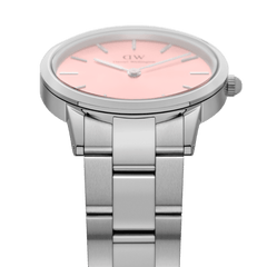 Detail view of the Iconic Link Blush Silver ladies watch, showing the brushed stainless steel bracelet and the soft pastel pink dial with minimalist silver hour markers.